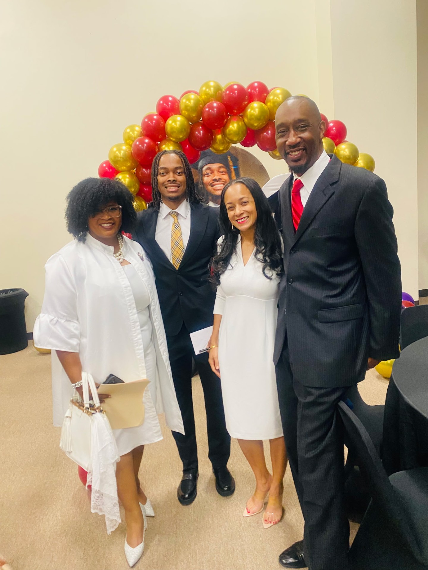 Family celebration with balloons and honor