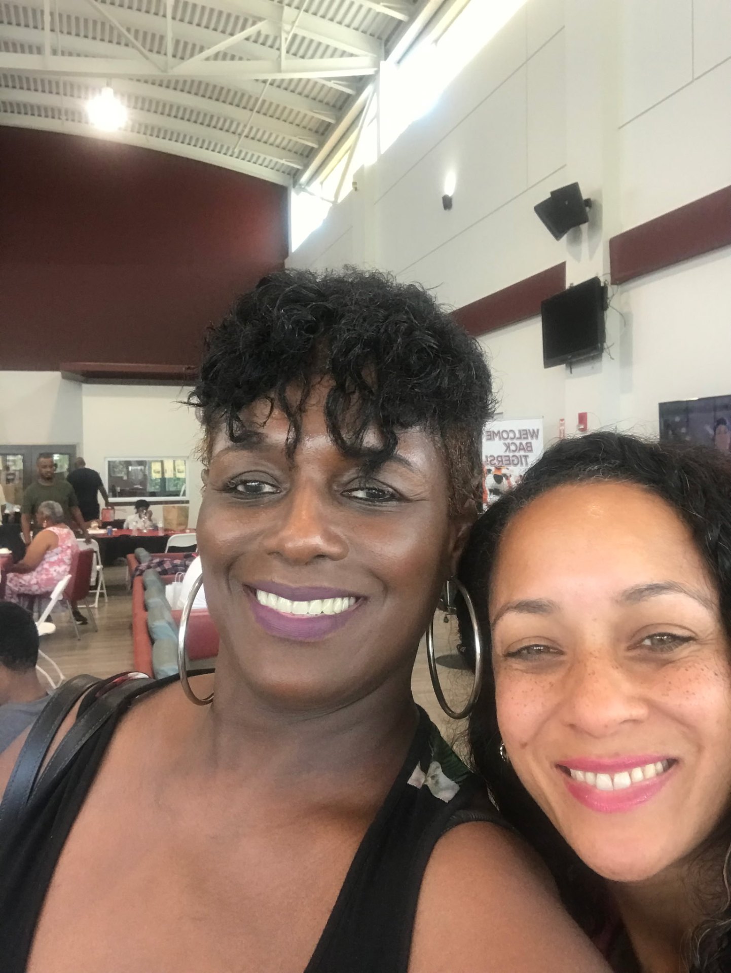 Community center gathering — Welcome Back Tigers